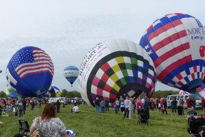 Balloons inflate for the 2015 Great Balloon Race in Louisville Kentucky