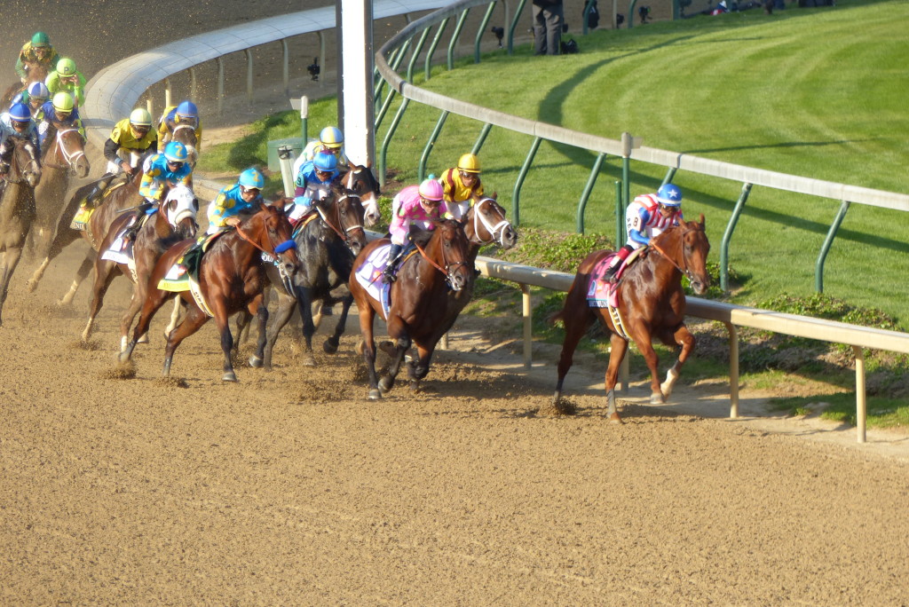 Dortmund charges to an early lead around turn 1 during the Kentucky Derby. 