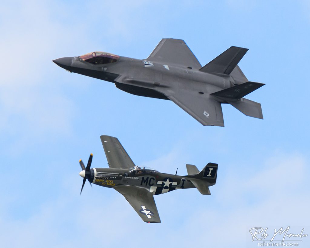 A P-51 Mustang and a F-35A Lighting II fly in the heritage formation.