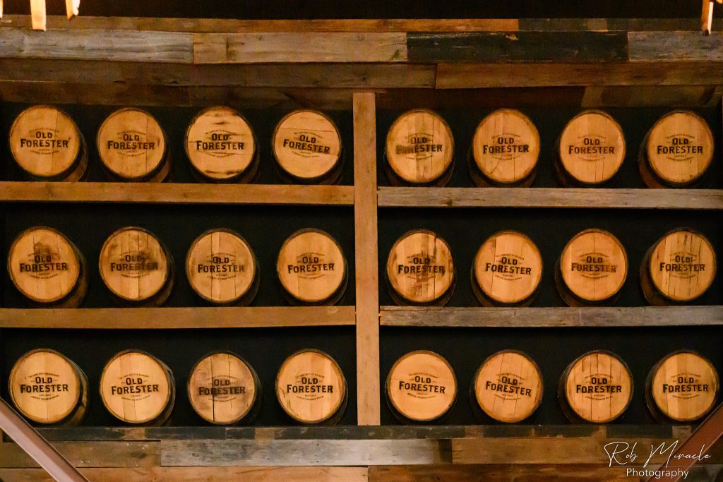 Bourbon Barrel lids on display at Merle's Whiskey Kitchen in three rows of eight barrel tops.